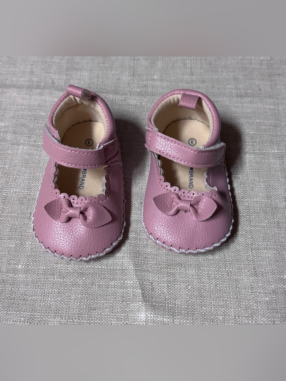 LUCKY BRAND INFANT GIRLS MARY JANE
CRIB SHOES w/BOW. SZ 3”